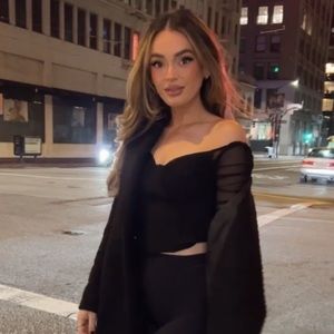 Privy black corset style top with ruched sheer sleeves and sweetheart neckline